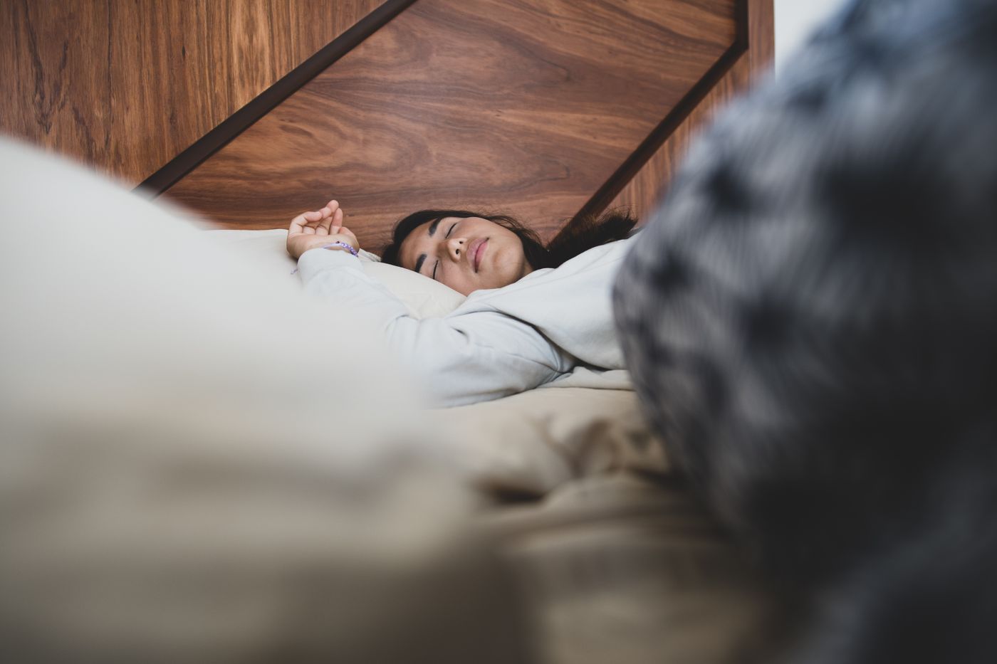 A woman resting in bed